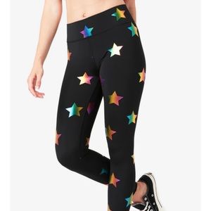 There’s uplift leggings in Black Rainbow Star Foil. Size XS